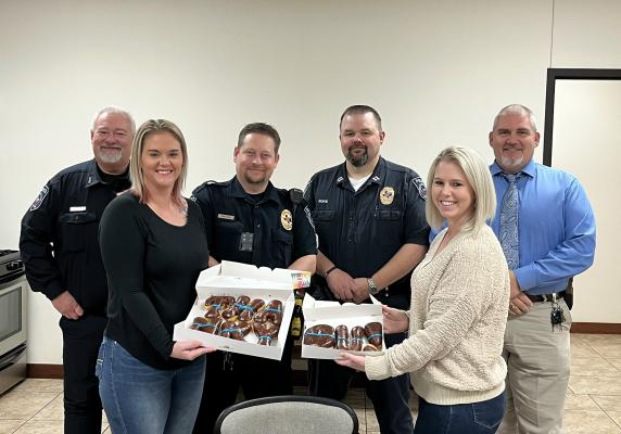Pictured from the left are SPD Chief Jay Reeves, Sealy News Sales Rep Amanda Luksha, Sergeant Chad Matura, Captain Scott Riske, News Publisher Amy Lieb and Detective Russell Grimes. COLE McNANNA