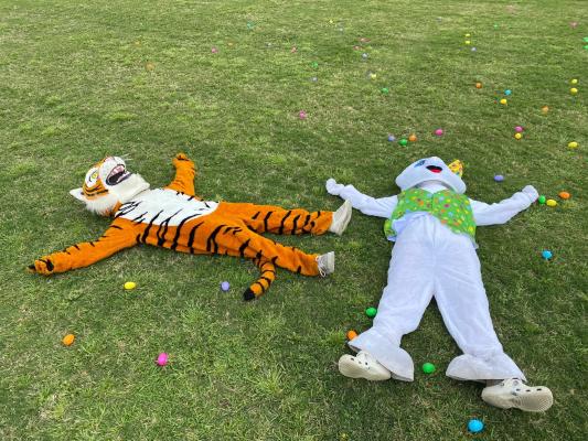 Sealy High School mascot Tiggy and the Easter bunny were wiped after all of the fun had at the annual Easter Eggstravaganza event at B&PW Park April 10. COURTESY PHOTO