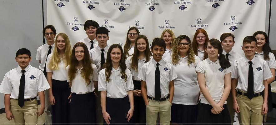 Faith Academy of Bellville inducted 18 new members into the National Junior Honor Society in a recent ceremony. Pictured from left to right in the back row art Colton Randall, Seth Blaschke, Allison Bashaw, Allison Bauer, Hayley Gillen, Everett Yates and Georgia Carroll. In the middle row are Faith Brooks, Jackson Dunn, Logan Ammon, Emma Duron, Caitlyn Brookes and Ethan Stegent. In the front row are Dyllan Olivares, Laynie Spitzer, Mia Odom and Josh Hardy. CONTRIBUTED PHOTO
