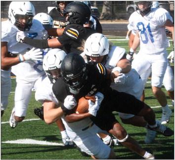 Sealy found some running room against a strong Episcopal defense during last Friday’s scrimmage.