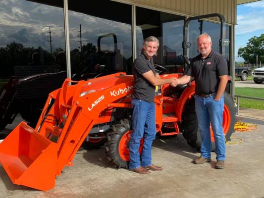 Tuesday morning, Jeff Virnau announced the sale of Virnau Sealy Tractor to Chris Wackman of Washington County Tractor. CONTRIBUTED PHOTO