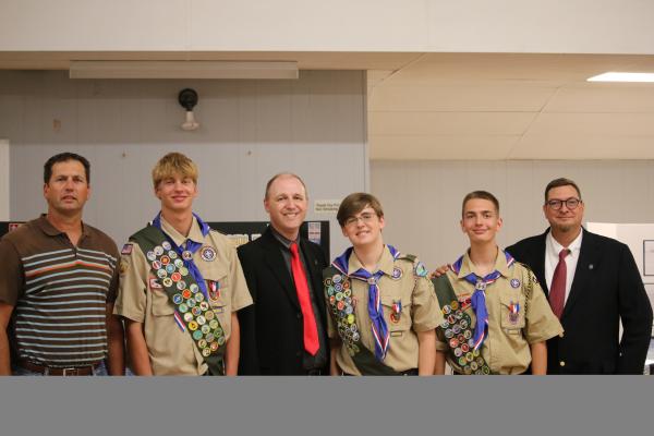 The Sealy Eagle Scouts were joined by their fathers at the Legion Hall ceremony. Pictured from the left are Justin and Cameron Eschenburg, Steven and Zander Crawley and Ike and Michael Konvicka. COURTESY PHOTO