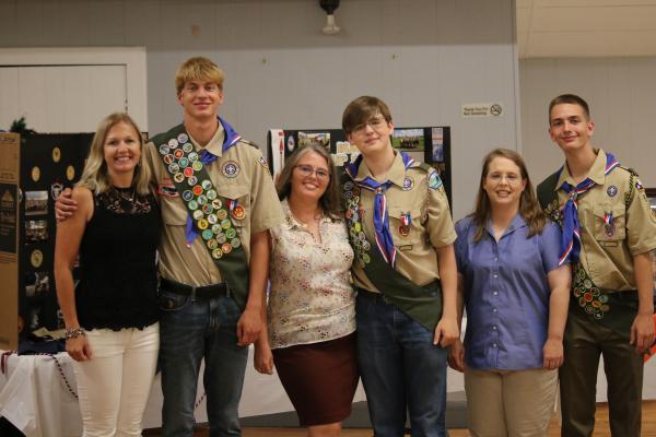 The scouts who recently completed Eagle Scout projects were celebrated at the Legion Hall alongside their mothers. Pictured from the left are Laura and Cameron Eschenburg, Lynnette and Zander Crawley and Anita and Ike Konvicka. COURTESY PHOTO