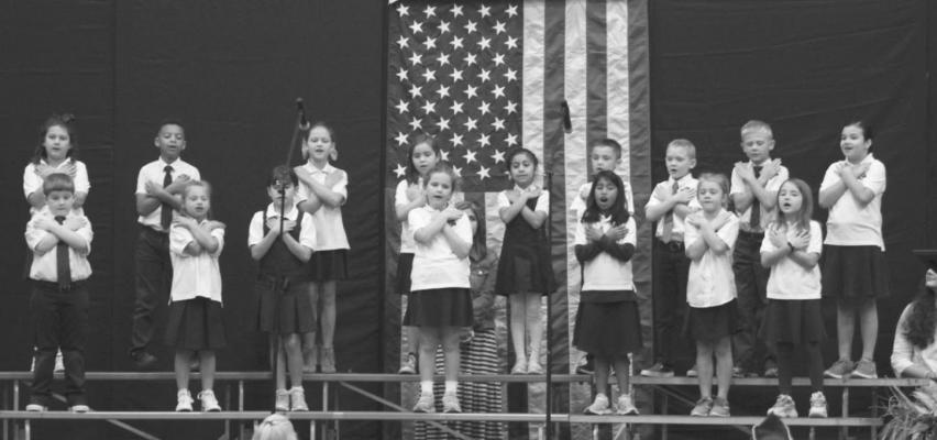 Faith Academy second graders, led by teachers Mrs. Payne and Mrs. Stallings, sang “I’m in The Lord’s Army,” and “God Bless America,” during the Veterans Day program Nov. 8. CONTRIBUTED PHOTO