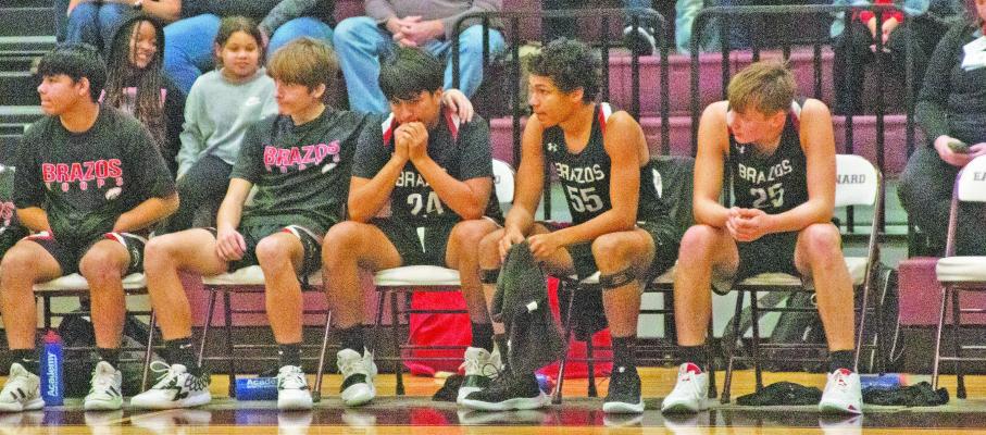The Brazos bench laments the ending of the second overtime in the Cougars’ loss to Boling last Friday. PHOTOS BY JIMMY GALVAN