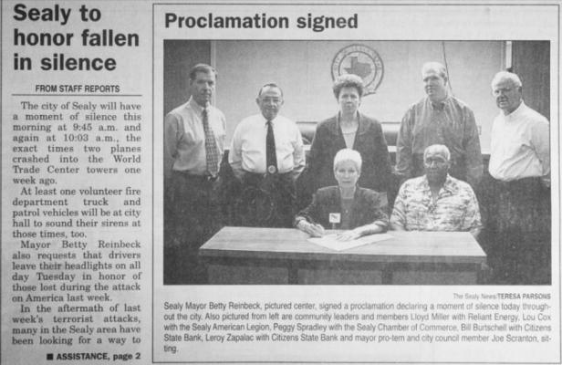 The Sealy News’ front page from Sept. 18, 2001 shows then-Sealy Mayor Better Reinbeck signing a proclamation declaring a moment of silence for the lives lost. Pictured standing behind the mayor from left are Lloyd Miller, Lou Cox, Peggy Spradley, Bill Burttschell and Leroy Zapalac. Then-Mayor pro-tem and city councilmember Joe Scranton is sitting next to Reinbeck.