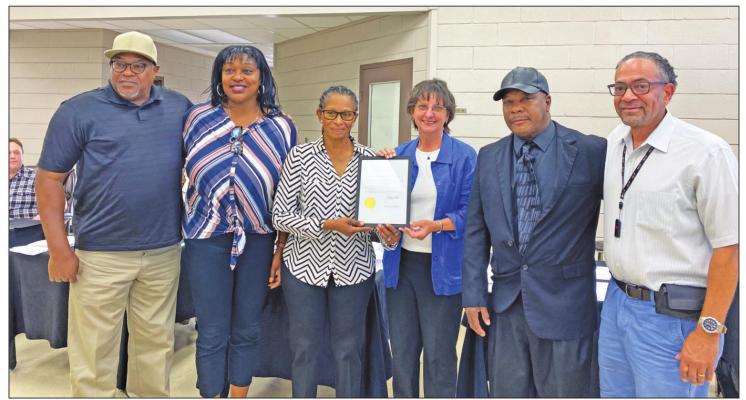 The Brown Sugar Band was honored with a proclamation by the Sealy City Council June 21. Pictured from left to right: Pernell Carroll, Tasha Johnson, Sandra “Brown Sugar” Lee, Mayor Carolyn Bilski, Fred Lockett, and Joseph Harrison. RAE DRADY