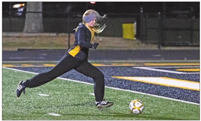 Lady Tiger freshman Elizabeth Reichardt lines up a penalty-kick opportunity in the first half of Sealy’s regular-season finale against Royal at T.J. Mills Stadium Friday night, March 11. PHOTOS BY COLE McNANNA