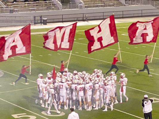 The Bellville Brahmas celebrate their victory over Jasper last Friday at Woodforest Bank Stadium in Shenandoah. Bellville will take on Wimberly this Friday in Plugerville for the right to advance to Dallas as the UIL State title game. COURTESY PHOTO