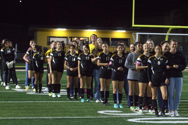 The Lady Tigers celebrate senior recognition night before their home clash against Bellville kicked off. PHOTOS BY ABENEZER YONAS