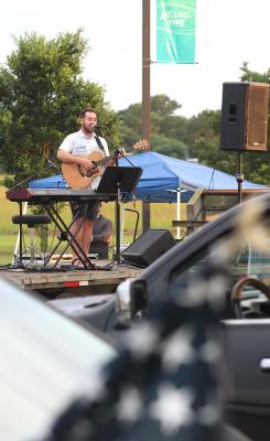 Josh Strzelecki provided live music at Christian City Fellowship’s Family, Faith and Fireworks event celebrating Independence Day Sunday, July 4, in Sealy. COLE McNANNA