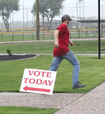 The final voter of the day left the Hill Center just before 7 p.m., just as the rain picked back up again. COLE MCNANNA