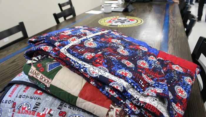 12 quilts created by members of the Cotton Boll Quilters were presented to EMS Station No. 2 in Sealy May 5. COLE MCNANNA