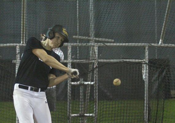 Sealy senior Rhys Reichardt connects with a pitch at the first official workout of the baseball season last Friday evening at Aubrey “Mutt” Stuessel Stadium. (Cole McNanna/Sealy News)