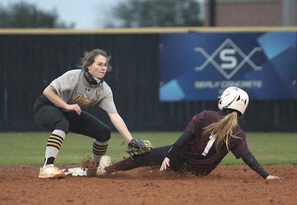 Sealy freshman Colette Kelley slaps a tag on an East Bernard baserunner during the Lady Tigers’ home scrimmage last Friday at Sealy High School. (Cole McNanna/Sealy News)