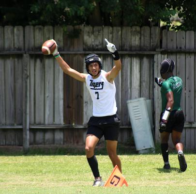 Tiger receiver Graham Samonte celebrates his second-half touchdown against Mayde Creek in 7-on-7 action at Taylor High School June 23. COLE McNANNA
