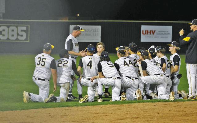 Sealy Head Baseball Coach Charles Marik talks with players after a recent game. CONTRIBUTED PHOTO