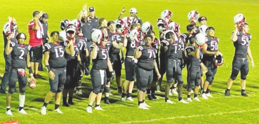 The Brazos Cougars acknowledge the fans while singing the school song after the 23-8, season-opening win over Anderson-Shiro last Friday at Cougar Stadium. CONTRIBUTED PHOTO