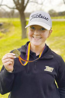 Sealy junior Carly Allen captured first place at the Weimer High School Golf Tournament last week. Seniors Kaylie Dabney and Grace Eschenburg also played well for the Lady TIgers in the tournament. COURTESY PHOTO