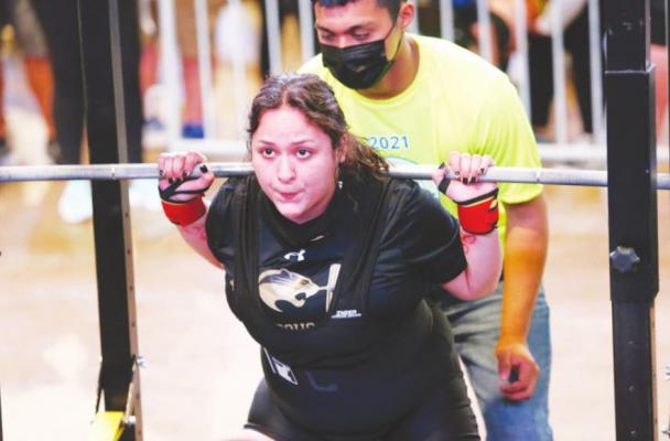 Brazos senior Halie Gonzalez attempts a squat during the Texas High School Women’s Powerlifting Association state championships in Corpus Christi March 18. A 15-pound personal record in the squat helped Gonzalez earn third place. PHOTOS COURTESY RYAN DUNSMORE/FORT BEND HERALD