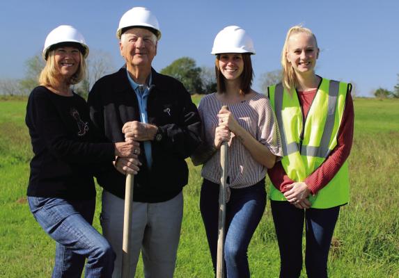 Rosberg Pet Resort broke ground on its new facility to be located at 2183 Hwy. 36 in Sealy and will feature boarding, grooming and daycare. Pictured left to right at the groundbreaking event are Kathy Bishop, George Bishop, Ashley Rosberg and Polly Rosberg. PHOTO BY AMANDA LUKSHA